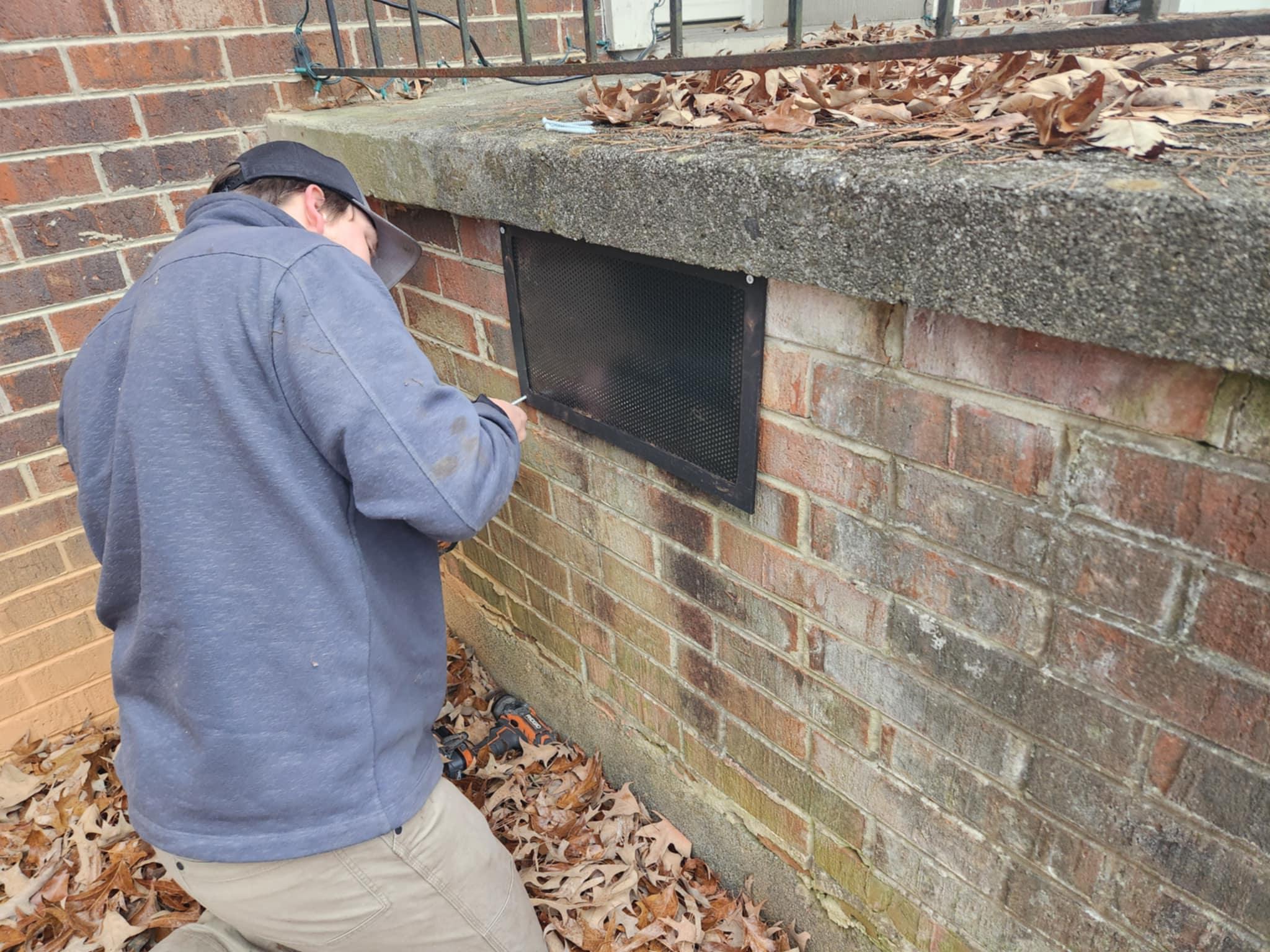 Critter Wranglers performing rodent exclusion and sealing on a home