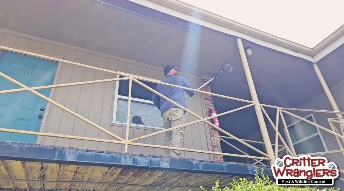 commercial-property-pest-control image Critter Wranglers technician with service van