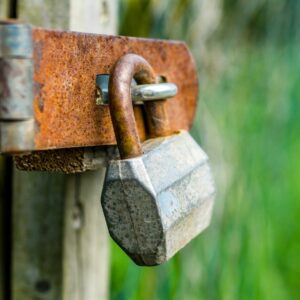 photo of a gate with a padlock